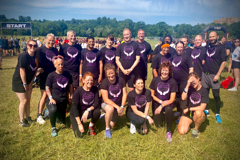 Team photo at the start line of a sports event